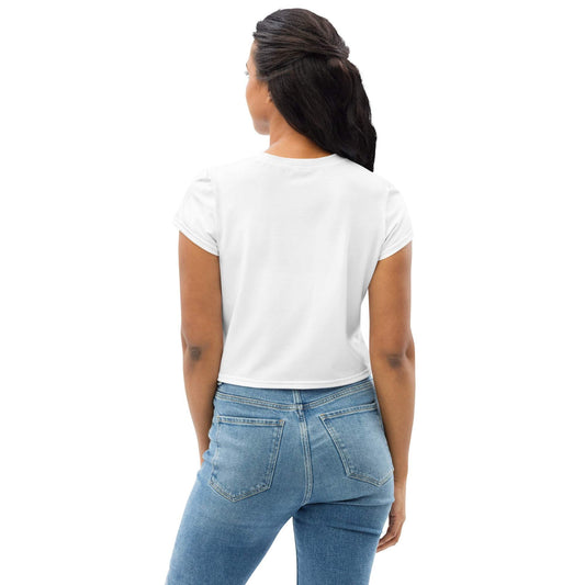 Women's Logo Crop Tee in white, regular fit, worn with blue jeans.