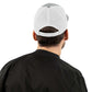 Man wearing a white Savage Squad Snapback, showing its adjustable mesh back.